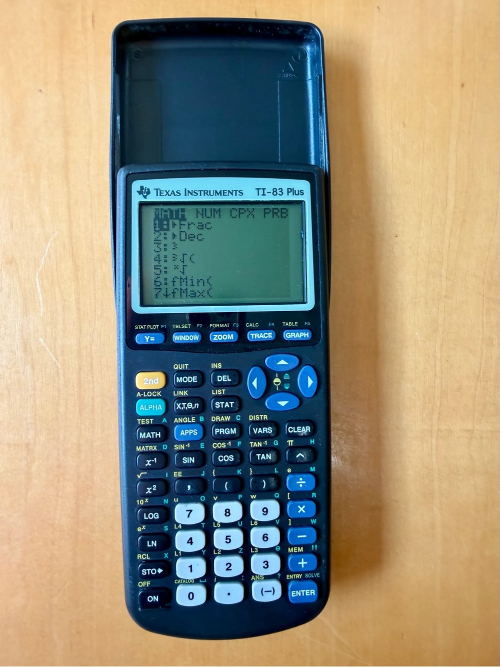 Texas Instruments TI-83 Plus Graphing Calculator With Manual - Black